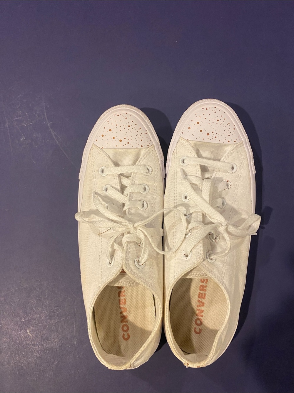 Converse Women's White Low-Top Canvas Sneakers with Subtle Pink Details